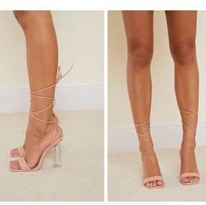 Nude, lace up, clear block 4 inch heel. Never worn.
